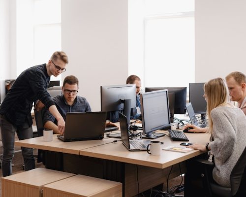 group-young-business-people-working-office_158595-5210